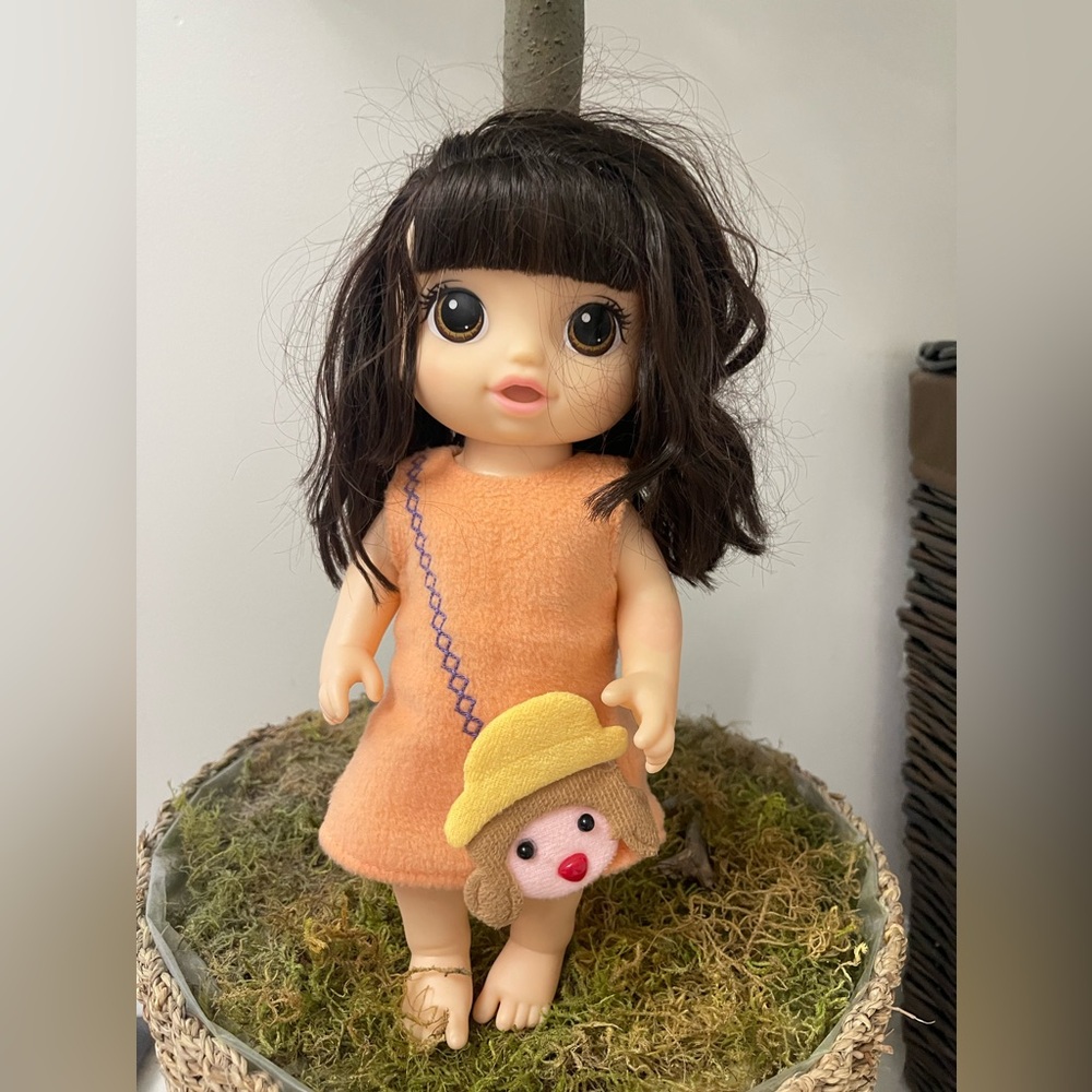 Adorable Doll with Orange Dress and Yellow Bag